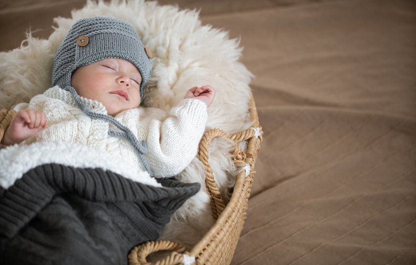 Süß eingepackter Baby Boy im Winter Süß eingepackter Baby Boy im Winter