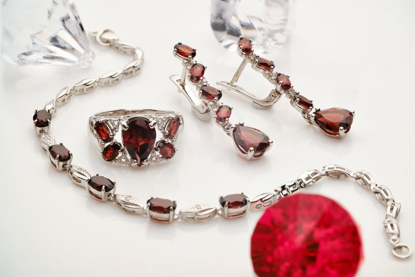 Elegant jewelry set. Jewellery set with gemstones. Jewelry accessories collage. Product still life concept. Ring, necklace and earrings. Elegant jewelry set. Jewellery set with gemstones. Jewelry accessories collage. Product still life concept. Ring, necklace and earrings.