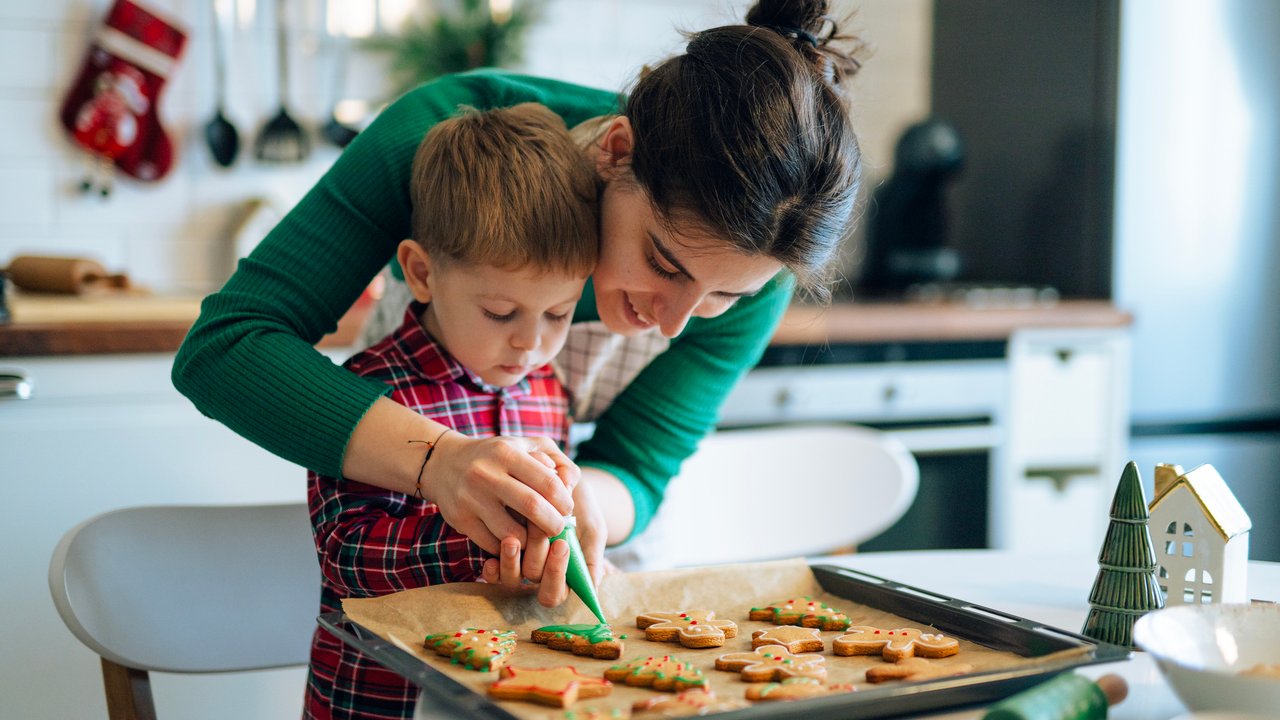 Mom and Son Decorating Homemade Christmas Cookies
