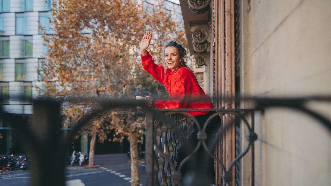 Woman greeting the neighbours during COVID-19 pandemic Woman greeting the neighbours during COVID-19 pandemic
