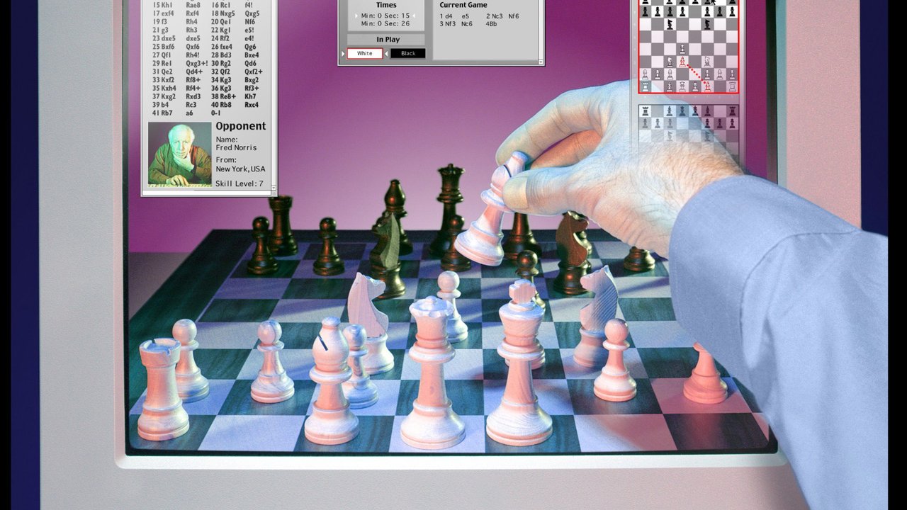 Mann spielt Schach gegen einen Computer