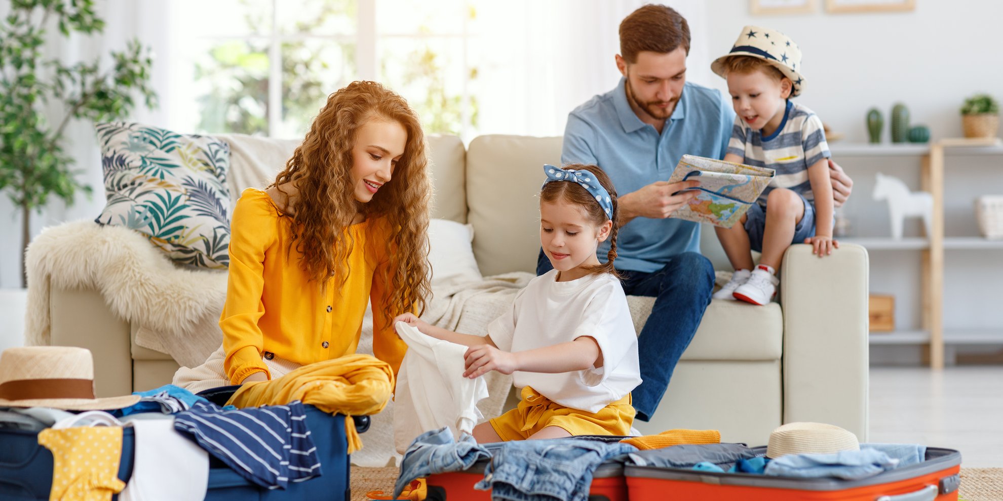 Packliste für den Familien­urlaub: 5 Check­listen zum download