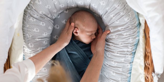 Süße Träume: 12 gemütliche Babybett-Nestchen für einen erholsamen Schlaf