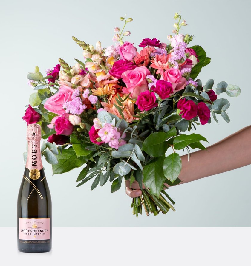 Geschenk zum Valentinstag: Blumenstrauß mit Champagner