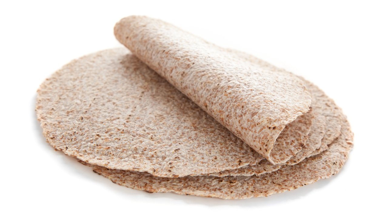 Sprouted wheat tortillas isolated on white