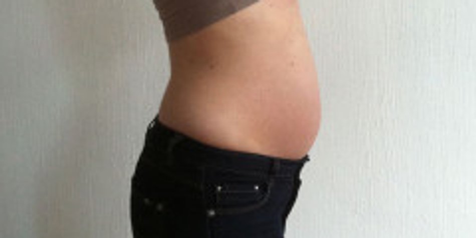 Bauch schwanger oder dicker Frühschwangerschaft /
