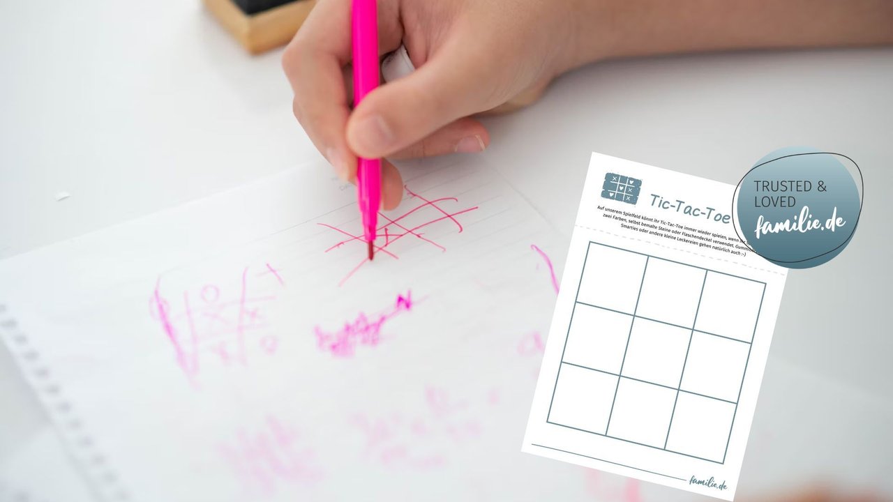 Spielanleitung Tic-Tac-Toe: Hand malt mit pinkfarbenem Stift Tic-Tac-Toe-Feld auf, daneben eine Spielfeldvorlage von familie.de