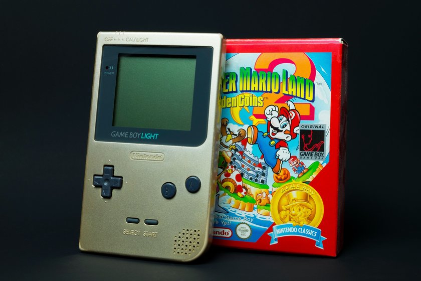 Boy Light console and Super Mario Land game box.