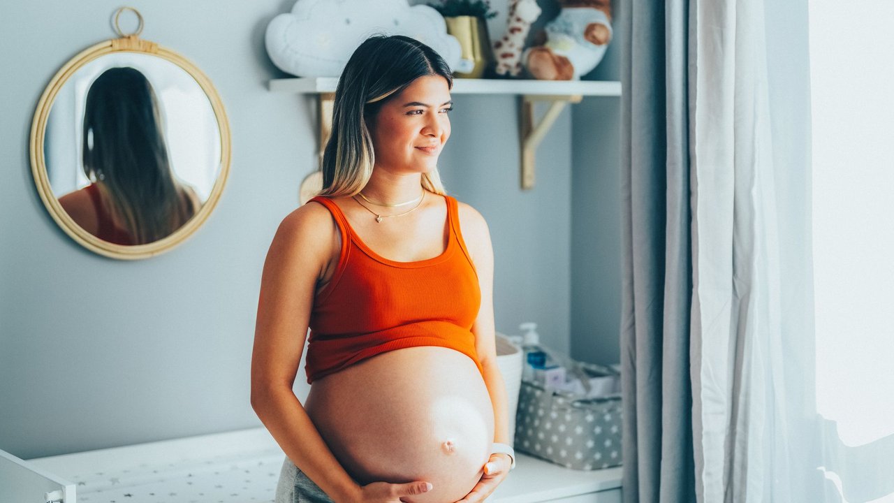 Young woman enjoying the last month of her pregnancy