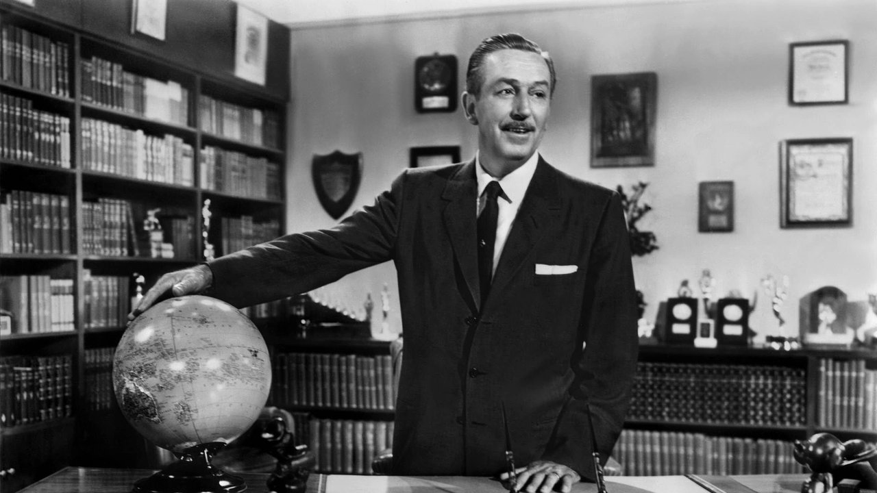 Walter Disney am Schreibtisch mit Globus 