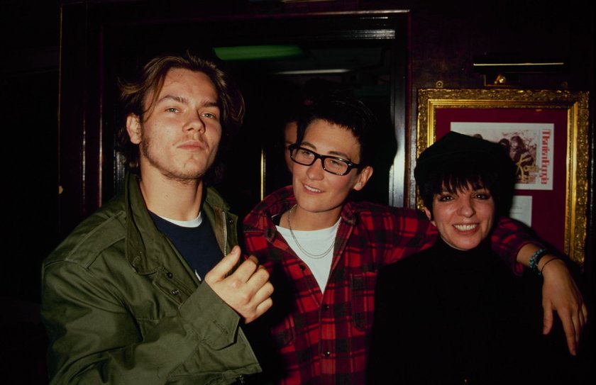 Actor River Phoenix, singer k.d. lang and actress Liza Minnelli help Rhino Records celebrate the release of its new compilation album 'Tame Yourself' to benefit PETA on February 28, 1991 at the Hard Rock Cafe in New York City.